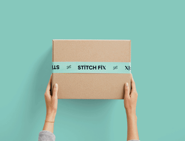 Brown and teal Stitch Fix box on a mint green background.